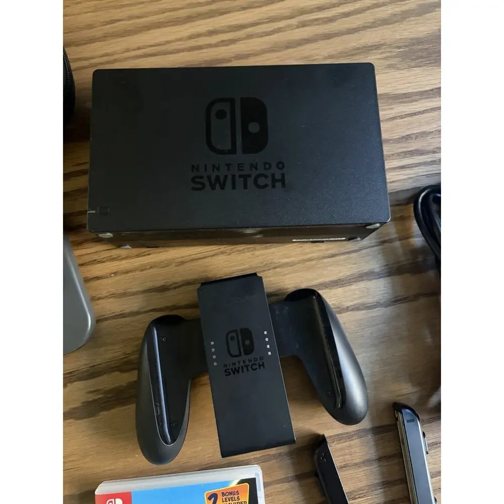 Nintendo Switch Console Gray Bundle with Games Kirby Pikachu Crash and Case